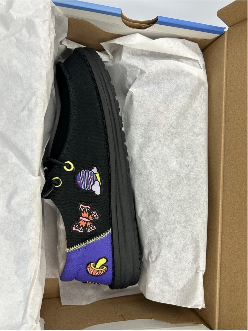 Women’s Black Canvas Sneakers with Purple Accent and Playful Embroidered Patches